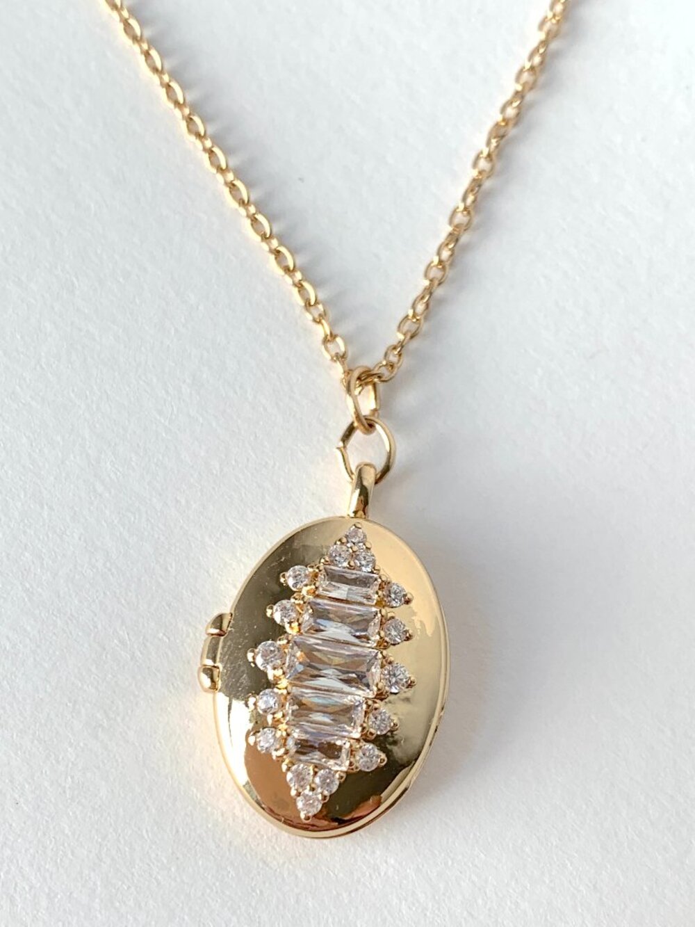 NEW ~ Anthropologie Oval CZ Baguette Gold Locket Necklace